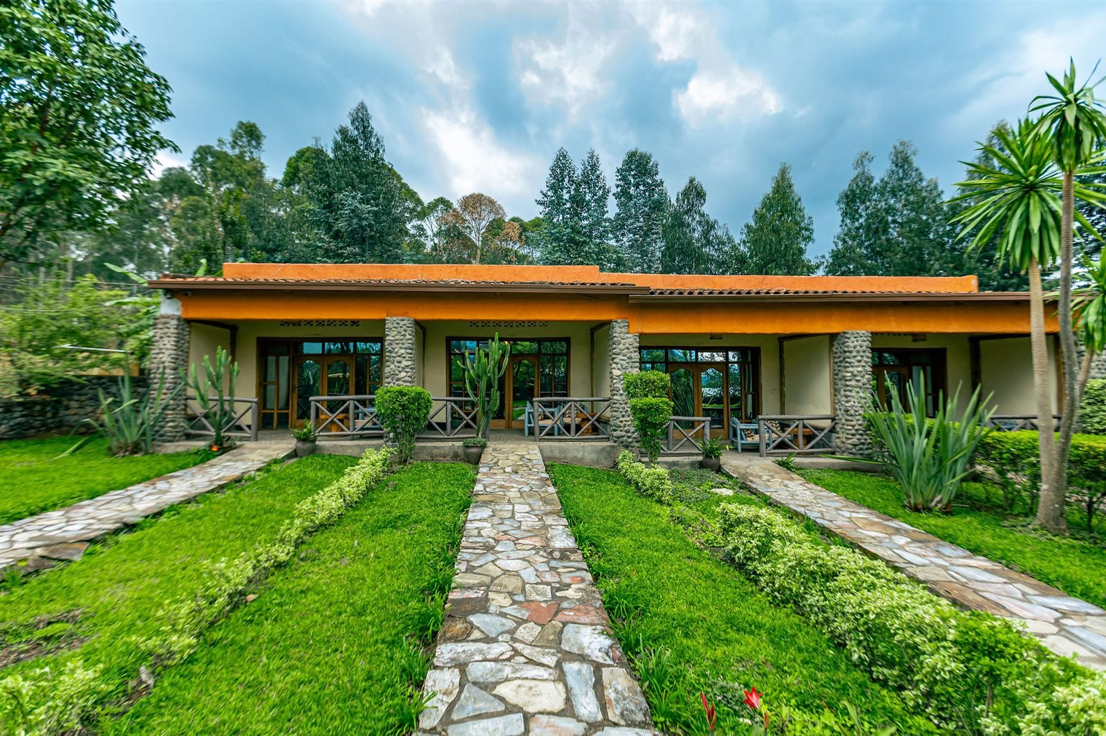 Stone-paved path through the resort lawns and gardens