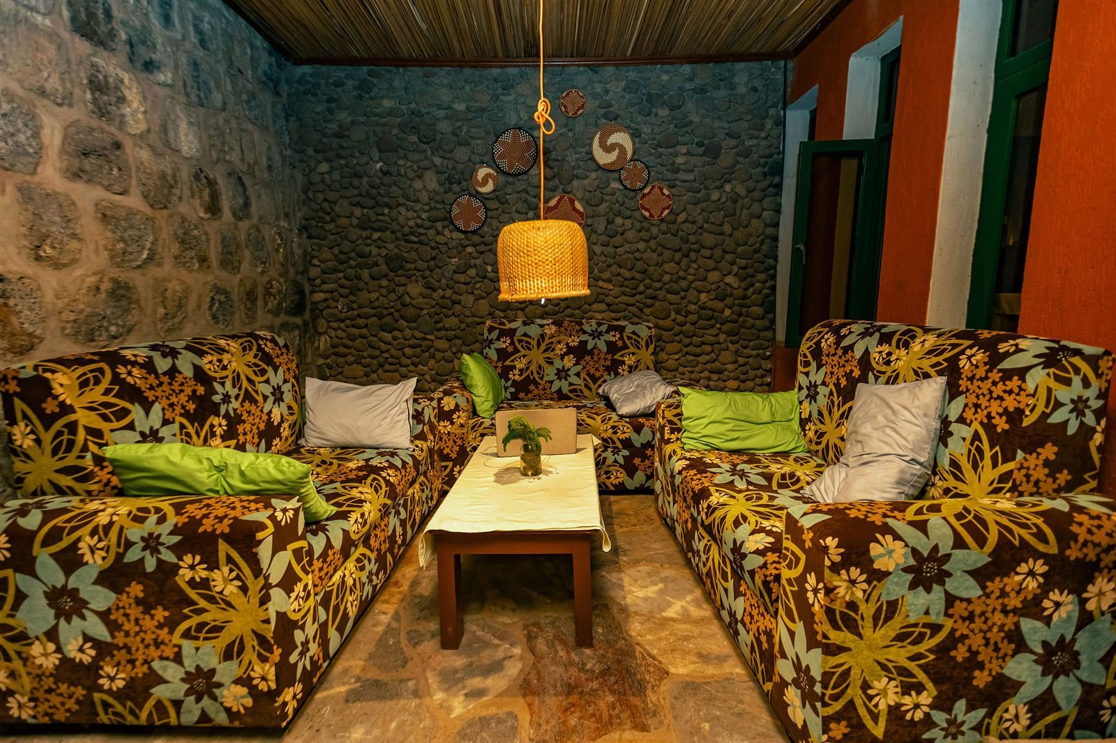 Lounge with patterned sofas and a wooden coffee table